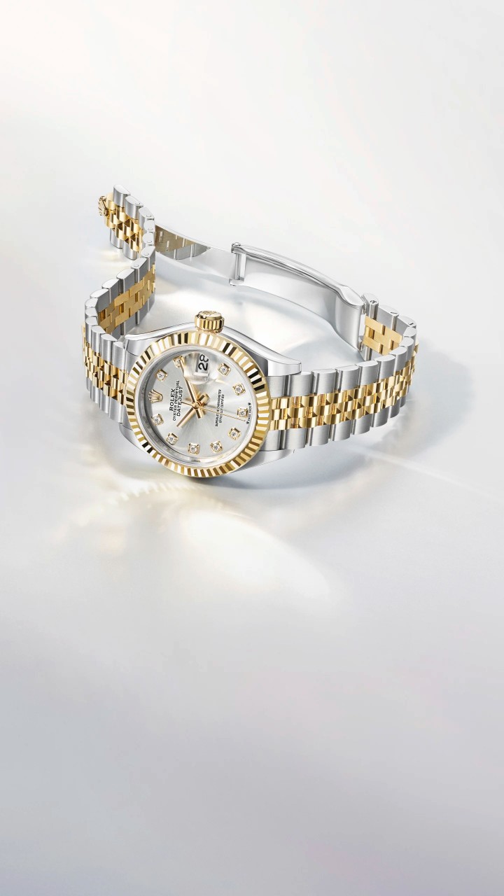 Rolex Lady-Datejust in Oystersteel and yellow gold with a fluted bezel, silver diamond-set dial and Jubilee bracelet